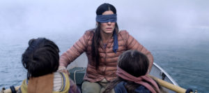 Bird Box Scene - Netflix Movie. Sandra Bullock blindfolded in a boat.
